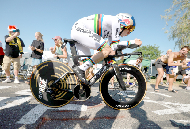 Evenepoel cuts Pogacar lead with time-trial win